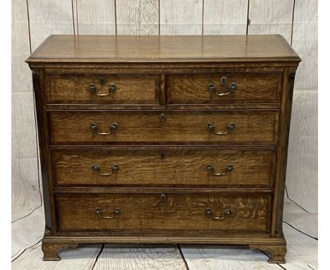 ANTIQUE OAK &amp; CROSSBANDED MAHOGANY CHEST of two short over three long oak lined drawers, having oval escutcheons and back