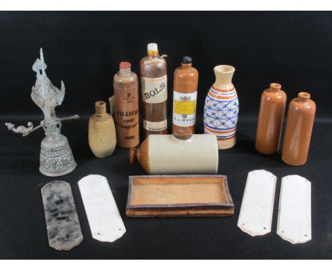 STONEWARE BOTTLES, ceramic door finger plates and a modern cast brass swing doorbell, 34cms H