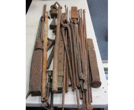 BLACKSMITH'S TOOLS &amp; EQUIPMENT, a mixed quantity including cast iron tongs, sash clamps ETC