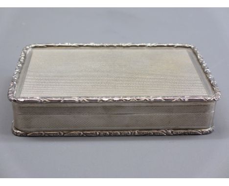 SILVER RECTANGULAR SNUFF BOX - London 1966, maker Padgett &amp; Braham Ltd, engine turned decoration with floral scroll edgin