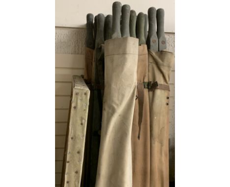 VINTAGE ARMY STYLE STRETCHERS (12), 226cms L along with an individual trestle base, canvas covered, 44cms H, 183.5cms L, 69cm