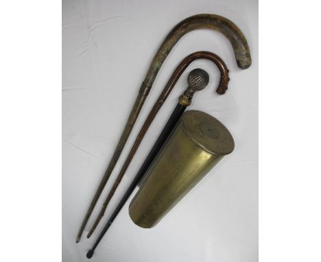 VINTAGE WALKING STICKS (3) and a 1914 dated shell casing in brass, one of the sticks bearing a collar stamped 'Souvenir from 