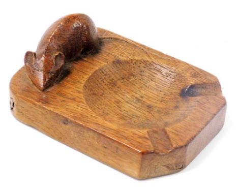 A Robert Thompson Mouseman oak ashtray, of rectangular shaped form with carved mouse, 10cm wide.