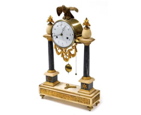 A late 19thC Louis XVI style French marble and ormolu portico clock, with circular enamel dial bearing Arabic numerals, eight