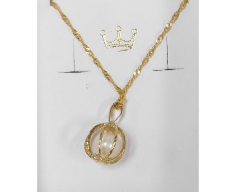 A 9ct gold and Isle of Wight pearl pendant, in a caged design, on a fancy link neck chain, 3.2g, boxed.