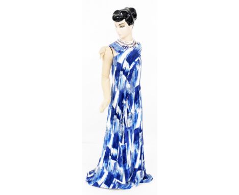 A 1950s composition mannequin of a lady, stamped to base Siecel, 121cm high.