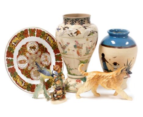 A group of ceramics, including a Beswick Afghan hound, Hummel figures, a Goebel figure of a blue bird, Japanese satsuma vase,