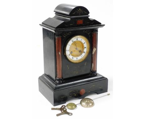 A late 19thC French slate and marble mantel clock, engine turned brass dial, with enamel chapter ring bearing Roman numerals,