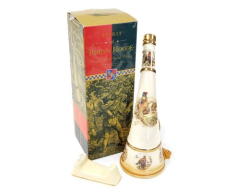 A bottle of Spirit of Robyn Hoode single malt scotch whisky, in an English porcelain hunting horn, decorated with 22ct gold, 