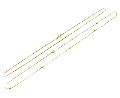 An 18ct gold cable link neck chain, on a bolt ring clasp, and a further neck chain set with gold beads at intervals, on a bol