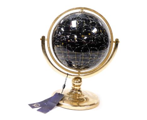 A Night Sky terrestrial globe, inset with mother of pearl, aragonite, against a black agate globe, on a brass base, numbered 