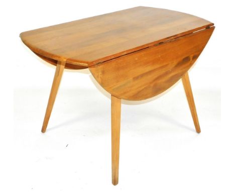 An Ercol elm and ash drop leaf dining table, raised on tapering square outswept legs, 70cm high, 112cm wide, 65cm deep, 122cm