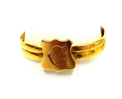 A Victorian lady's gold signet ring, of double banded form, with shield surmount engraved with the initial C, bears hallmarks