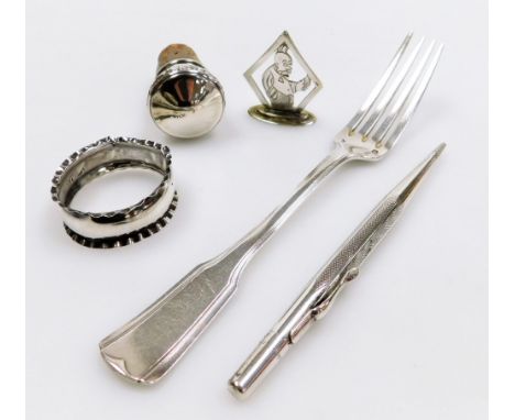 A group of silver and white metal items, to include silver napkin ring, wine bottle stopper, raised leaf and berry decoration