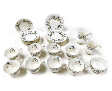 A Royal Albert Brigadoon pattern porcelain part tea service, comprising cream and milk jugs, nine teacups, eight saucers and 