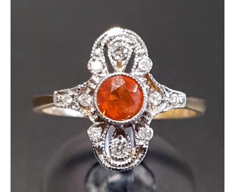 ATTRACTIVE ART DECO STYLE FIRE OPAL AND DIAMOND PLAQUE RINGthe central round cut fire opal in multi diamond set pierced and s