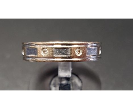 DIAMOND SET EIGHTEEN CARAT WHITE GOLD BANDring size K, the band set with eight equally spaced small diamonds, approximately 3