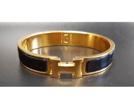 HERMÉS CLIC H BRACELETthe hinged bangle with black enamel decoration 