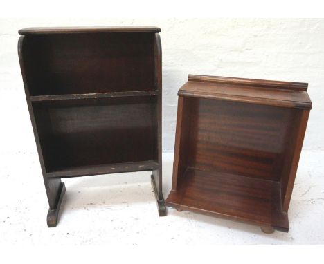 SMALL MAHOGANY BOOKCASEwith an oblong top above shaped sides with two shelves below, standing on flattened supports, 69.5cm h