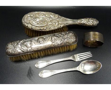 SELECTION OF SILVER ITEMScomprising a silver backed Art Nouveau hairbrush with embossed scroll and floral decoration, Birming