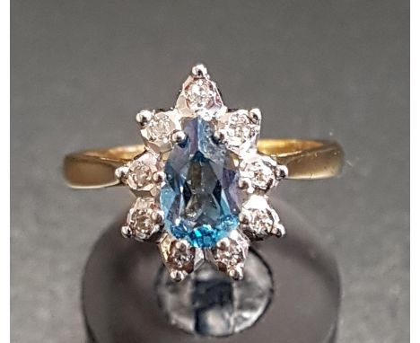 BLUE TOPAZ AND DIAMOND CLUSTER RINGthe pear cut blue topaz approximately 0.75cts in nine diamond surround, on nine carat gold