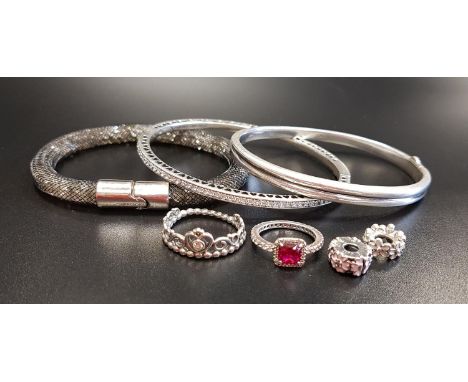 SELECTION OF FASHION JEWELLERYcomprising a Links of London silver hinged bangle, a Pandora Radiant Hearts white enamel and CZ