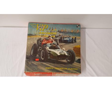 V.I.P. RACEWAY RACE CAR SETcomprising two race cars, track and power bank, with original manual, boxed 