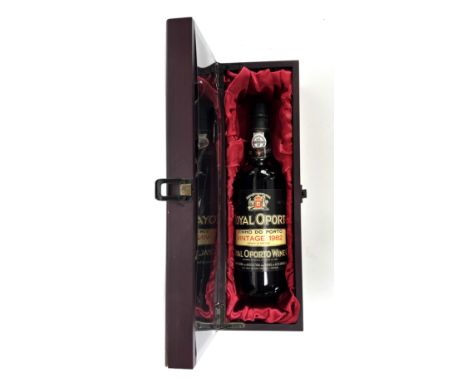 A 1982 bottle of Royal Oporto port in gift box with bar tools.&nbsp;