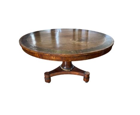A fine George IV rosewood hall table, circa 1825, by S.Jamar  with a circular tilt top, inlaid with a wide band of gilt brass