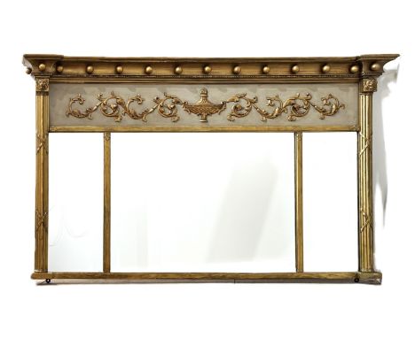 A Regency style overmantel mirror, with three oblong plates,   a deep moulded cornice with decorative balls and parcel gilt d