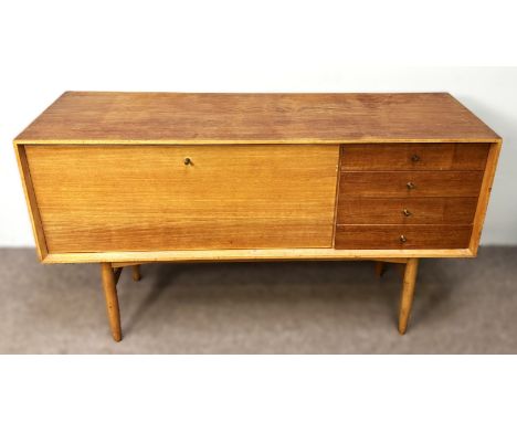 A mid-century Heals sideboard, circa 1960, probably designed by Alfred Cox Kenton,  with fall front cabinet and four offset d