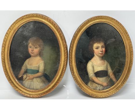 Manner of JAMES LATHAM, IRISH, 18TH CENTURY, A pair of portraits of children,   Oil on panel (or laid on board), in oval, eac