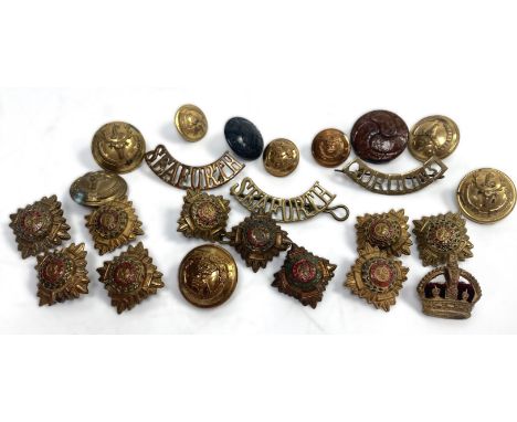 MILITARIA: A collection or badges and buttons, and a white metal topped officers Regimental cane, (a lot).  Provenance:Lt. Co