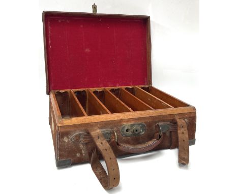 A fine leather and oak cartridge case, early 20th century, manner of Asprey & Co., London,   the brass bound leather case ope
