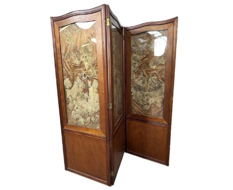 A 19th century mahogany three fold screen, inset with embroidered panels depicting 17th century figures in landscapes,   each