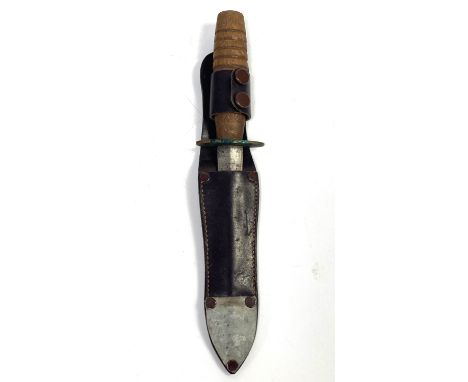 MILITARIA: A WWII Fairburn Sykes Commando type Fighting Knife,   with wood handles and sheath, 28cm long.  Provenance: Captai