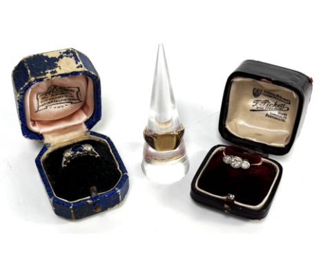  A Diamond three stone engagement ring, set with approx 0.5 carats (gross)   old brilliant cut diamonds, in faceted edge sett