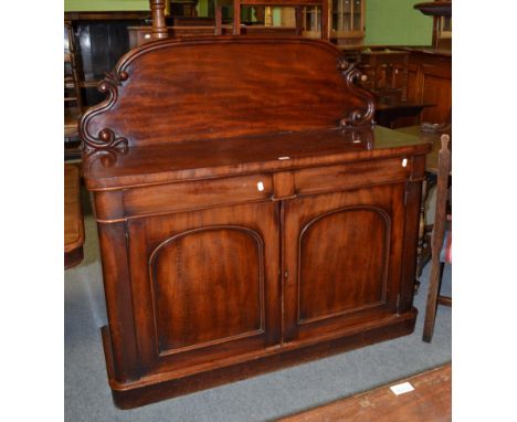 A Victorian mahogany sideboard with interior shelf and cellaret 