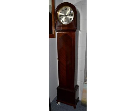 A chiming longcase clock, chiming on gong rods 