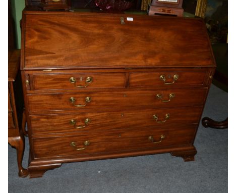 A George III mahogany bureau on ogee bracket feet 