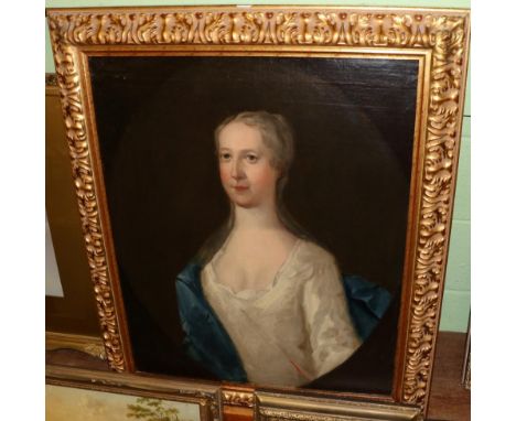 Manner of Sir Godfrey Kneller, Portrait of a Lady, half length wearing a white satin dress with blue sash, in a feigned oval 