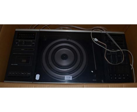A Bang and Olufsson record player and pair of speakers