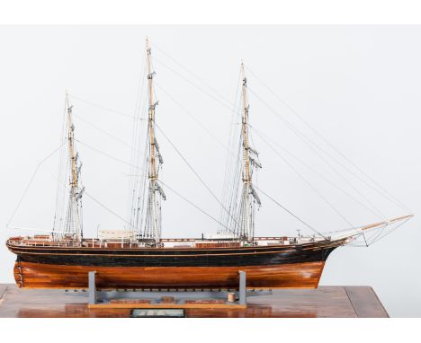 A fine hand-built wooden scale model ship, Cutty Sark, on a painted wooden stand, model length 167cm, height 115cm.The Cutty 