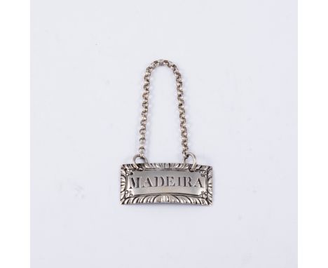 George III tablet shape silver decanter label 'MADEIRA', Hester Bateman, late 18th Century, pierced lettering, gadrooned outl