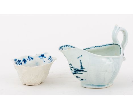 English porcelain blue and white butter boat, probably Worcester, 1760s, press moulded with leaves, painted with flowers, pai