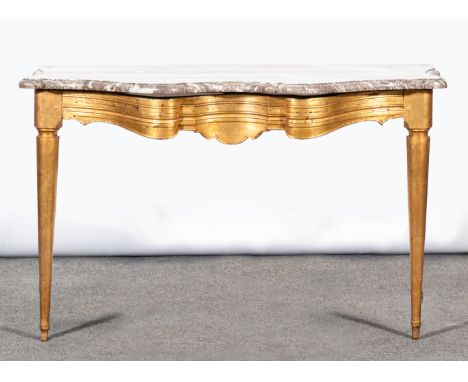 Console table, gilt wood, with reeded front and shaped apron, serpentine variegated marble top, width 115cm. height 73cm.