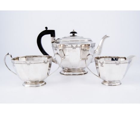 Art Deco three-piece silver teaset, Pearce & Sons, Sheffield 1935, shouldered polygonal form with engraved decoration, compri