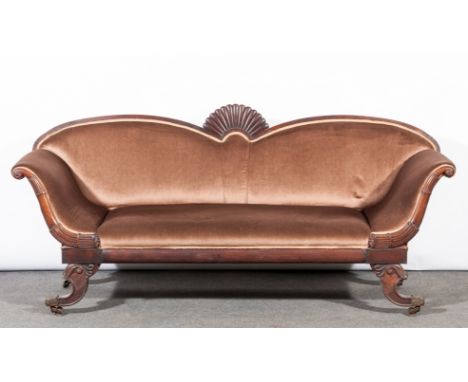 Regency rosewood sofa, arched fluted back, swept arms, splayed legs with brass caps, on castors, length 213cm, depth 69cm, he