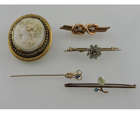 A Belle Epoque sapphire and pearl set yellow metal stock pin, together with three bar brooches and a cameo brooch, total weig