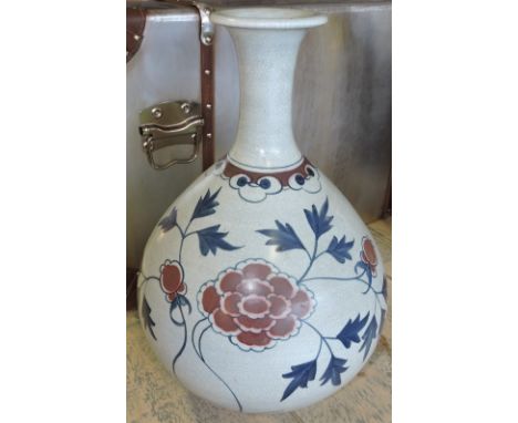 An contemporary large Chinese vase, hand painted with stylised leaf and flower band. Red seal mark and signature to base.
